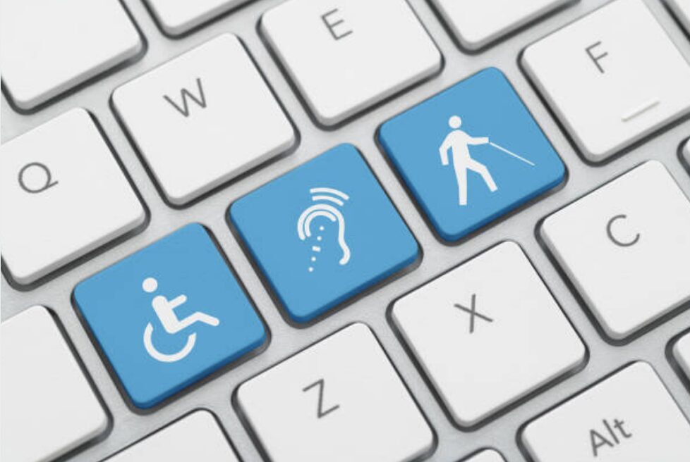Three accessibility icon on computer keyboard